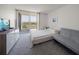 Cozy bedroom with access to balcony and scenic community views at 6279 Sun Blvd # 605, St Petersburg, FL 33715