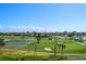 This property offers views of a golf course, pond, and palm trees at 6279 Sun Blvd # 605, St Petersburg, FL 33715