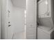 A laundry area features a stacked washer and dryer, as well as closet space at 6279 Sun Blvd # 605, St Petersburg, FL 33715