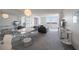 Open-concept living room featuring a modern interior design, large windows, and comfortable seating at 6279 Sun Blvd # 605, St Petersburg, FL 33715