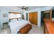 Bright bedroom with double closets, natural light, and wood accents at 6315 25Th N Ave, St Petersburg, FL 33710