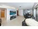 Open-concept living and dining area featuring neutral walls, terrazzo floors, and modern lighting at 6315 25Th N Ave, St Petersburg, FL 33710