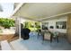 Outdoor patio with barbecue, seating, and partial shade at 6315 25Th N Ave, St Petersburg, FL 33710