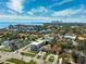 Stunning aerial view of a residential area, with lush greenery and beautiful homes near the water at 735 Snell Isle Ne Blvd, St Petersburg, FL 33704