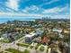 Picturesque aerial view of the neighborhood showcasing lush landscaping and waterfront proximity at 735 Snell Isle Ne Blvd, St Petersburg, FL 33704