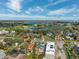 An aerial view of neighborhood streets, local golf course and views of Tampa Bay at 735 Snell Isle Ne Blvd, St Petersburg, FL 33704