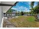 Expansive backyard featuring a patio area perfect for outdoor entertaining and relaxation at 735 Snell Isle Ne Blvd, St Petersburg, FL 33704
