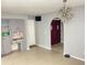 Bright dining room with built-in storage and view into front entryway, great for entertaining at 8630 Winter Haven Dr, Hudson, FL 34667
