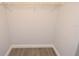 An empty closet in the property with no shelving, providing an open space to store belongings at 8659 Fancy Finch Dr # 102, Tampa, FL 33614