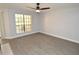 Spacious living room with modern flooring and bright natural light at 8659 Fancy Finch Dr # 102, Tampa, FL 33614