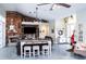 Bright living room with fireplace, stylish decor, and comfortable seating for entertaining at 8946 Old Pasco Rd, Wesley Chapel, FL 33544