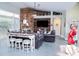 Inviting living room with fireplace, stylish decor, and comfortable seating for entertaining at 8946 Old Pasco Rd, Wesley Chapel, FL 33544
