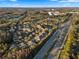 Aerial view of homes located on a busy street and retail area at 17106 Carrington Park Dr # 627, Tampa, FL 33647