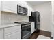 A well-equipped kitchen showcases modern appliances and stylish countertops at 17106 Carrington Park Dr # 627, Tampa, FL 33647