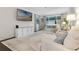 Bright and airy living room with large TV, comfortable seating, and ample natural light at 17106 Carrington Park Dr # 627, Tampa, FL 33647