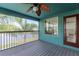 Balcony with water views and a ceiling fan at 10639 Carloway Hills Dr, Wimauma, FL 33598