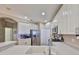 Bright kitchen featuring quartz counters and stainless steel appliances at 1154 Jameson Greens N Dr # 20, Sun City Center, FL 33573