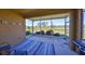 Relaxing screened patio offers beautiful views of the green backyard and serene pond at 1154 Jameson Greens N Dr # 20, Sun City Center, FL 33573