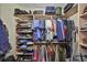 Walk-in closet with hanging storage, shelving and storage space for clothing and accessories at 1154 Jameson Greens N Dr # 20, Sun City Center, FL 33573