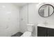 Modern bathroom with a sleek vanity, new fixtures, and elegant tile at 1212 E Crawford St, Tampa, FL 33604
