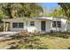 Charming single-story home with a neatly maintained front yard and freshly painted exterior at 1212 E Crawford St, Tampa, FL 33604