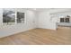 Spacious room featuring new floors, fresh paint, and natural light at 1212 E Crawford St, Tampa, FL 33604