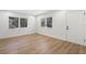 Sun-filled living room with wood flooring and ample natural light at 1212 E Crawford St, Tampa, FL 33604