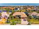 Expansive home with mature landscaping, three car garage, and tile roof in a waterfront community at 1335 Jumana Loop, Apollo Beach, FL 33572