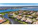 Beautifully landscaped home on canal offering serene water views, swimming pool, and outdoor living spaces at 1335 Jumana Loop, Apollo Beach, FL 33572