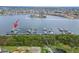 Aerial view of marina with boat slips and waterfront homes, showcasing boating community and access at 1335 Jumana Loop, Apollo Beach, FL 33572