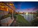 Enjoy relaxing lake views from the backyard swing on a manicured lawn at 1335 Jumana Loop, Apollo Beach, FL 33572