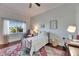 Cheerful bedroom with hardwood floors, a colorful rug, and natural light at 1335 Jumana Loop, Apollo Beach, FL 33572