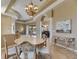 Formal dining room with decorative furniture and views of the pool and outdoor area at 1335 Jumana Loop, Apollo Beach, FL 33572