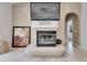Close up of the fireplace and mantel in the living room, featuring tile surround at 1335 Jumana Loop, Apollo Beach, FL 33572
