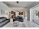 Open concept living room and kitchen area with tile floors and a view to the outdoors at 1335 Jumana Loop, Apollo Beach, FL 33572
