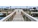Marina walkway surrounded by other boats that are docked at 1335 Jumana Loop, Apollo Beach, FL 33572