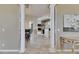 Inviting open floorplan with elegant columns and a seamless flow from the dining to living areas at 1335 Jumana Loop, Apollo Beach, FL 33572
