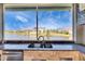 Enjoy outdoor cooking with a view. Includes a built in sink, grill and lake view at 1335 Jumana Loop, Apollo Beach, FL 33572