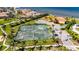 Enjoy the two community tennis courts surrounded by mature palm trees and lush landscaping at 1335 Jumana Loop, Apollo Beach, FL 33572