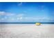 Beautiful beach view with pristine white sand and calm blue waters, an idyllic location at 13500 Gulf Blvd # 505, Madeira Beach, FL 33708