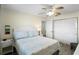 Inviting bedroom with a bed, nightstand, closet, and a calm, relaxing ambiance at 13500 Gulf Blvd # 505, Madeira Beach, FL 33708