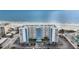 Aerial view of the Sea Breeze Condominiums in Madeira Beach with parking and beach access at 13500 Gulf Blvd # 505, Madeira Beach, FL 33708