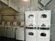 On-site laundry room has coin-operated washers and dryers for resident use at 13500 Gulf Blvd # 505, Madeira Beach, FL 33708