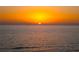 Stunning ocean view during sunset, showcasing peaceful waters and brilliant, colorful sky at 13500 Gulf Blvd # 505, Madeira Beach, FL 33708