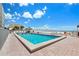 Enjoy a refreshing swim in the sparkling pool with beach views at 13500 Gulf Blvd # 505, Madeira Beach, FL 33708