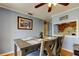 Casual dining area with seating for four, light blue walls, and decorative wall art at 136 Sycamore Ln # C, Oldsmar, FL 34677