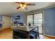 Bright dining space with a modern table setting and access to a deck at 136 Sycamore Ln # C, Oldsmar, FL 34677