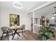 Cozy dining area with modern table and chairs, and large window at 15306 Winterwind Dr, Tampa, FL 33624