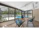 Enclosed lanai with comfortable seating and views of the pool area at 15306 Winterwind Dr, Tampa, FL 33624