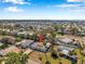 Aerial shot of the neighborhood with a great view of the home, the yard, and nearby houses at 2007 Yale Ave, Bradenton, FL 34207